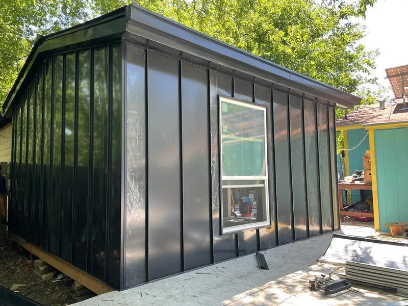 Black standing seam metal wall panels for Roof Inspection in Coventry