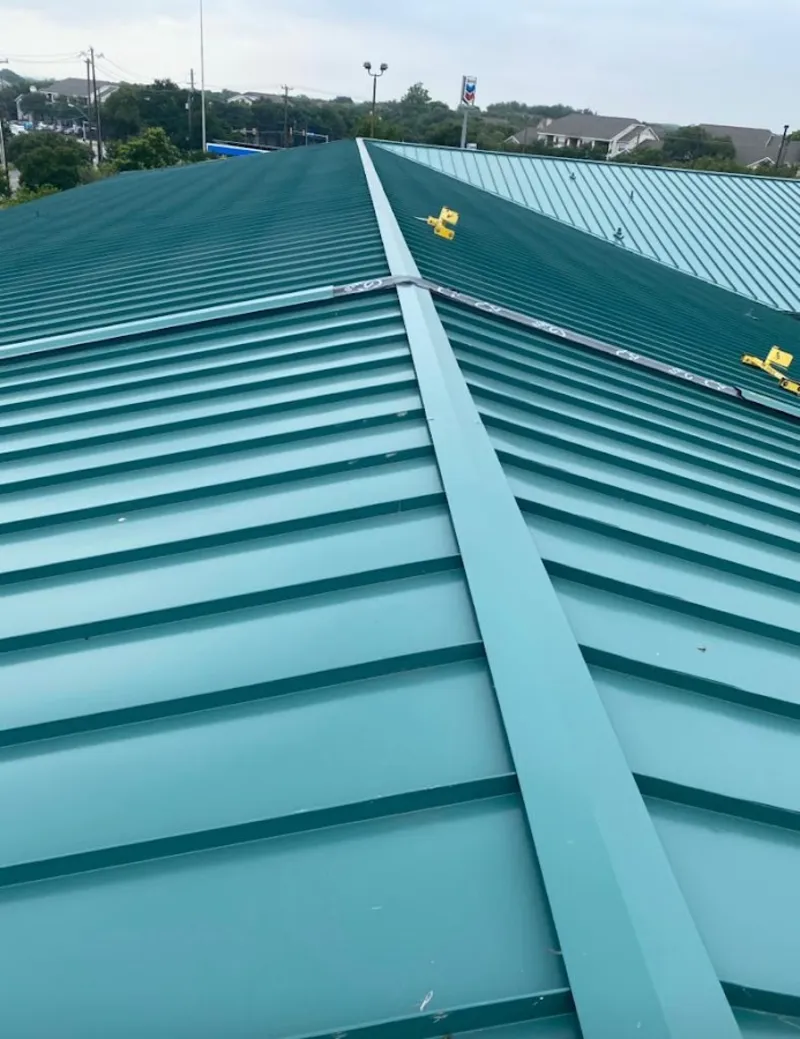 Green commercial metal roof ridge and valley for Metal Roof Repair in Coventry